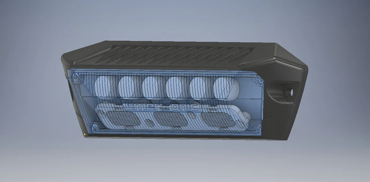 AXION LAMP — a visualization of the complete lamp: a dark housing with a finned heatsink, six round lenses and three rectangular modules visible through the front lens